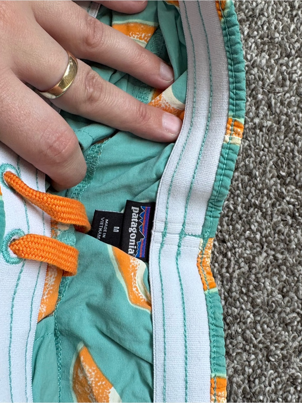 Patagonia Teal Athletic Shorts with Orange Fruit Print - Picture 2 of 2
